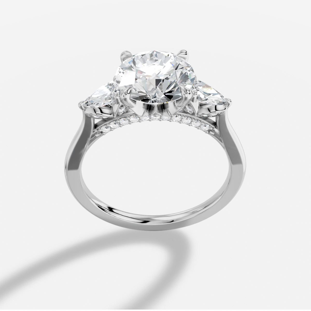 Round Three stone Diamond Ring in 18K White Gold