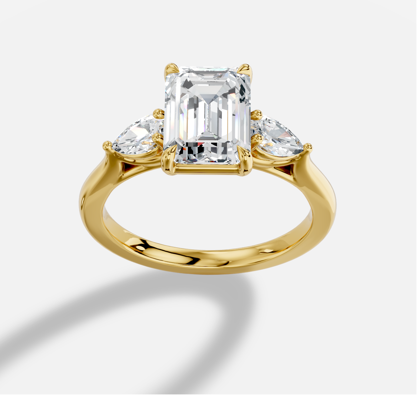 Emerald Cut Three Stone Diamond Ring  in 18K Yellow Gold