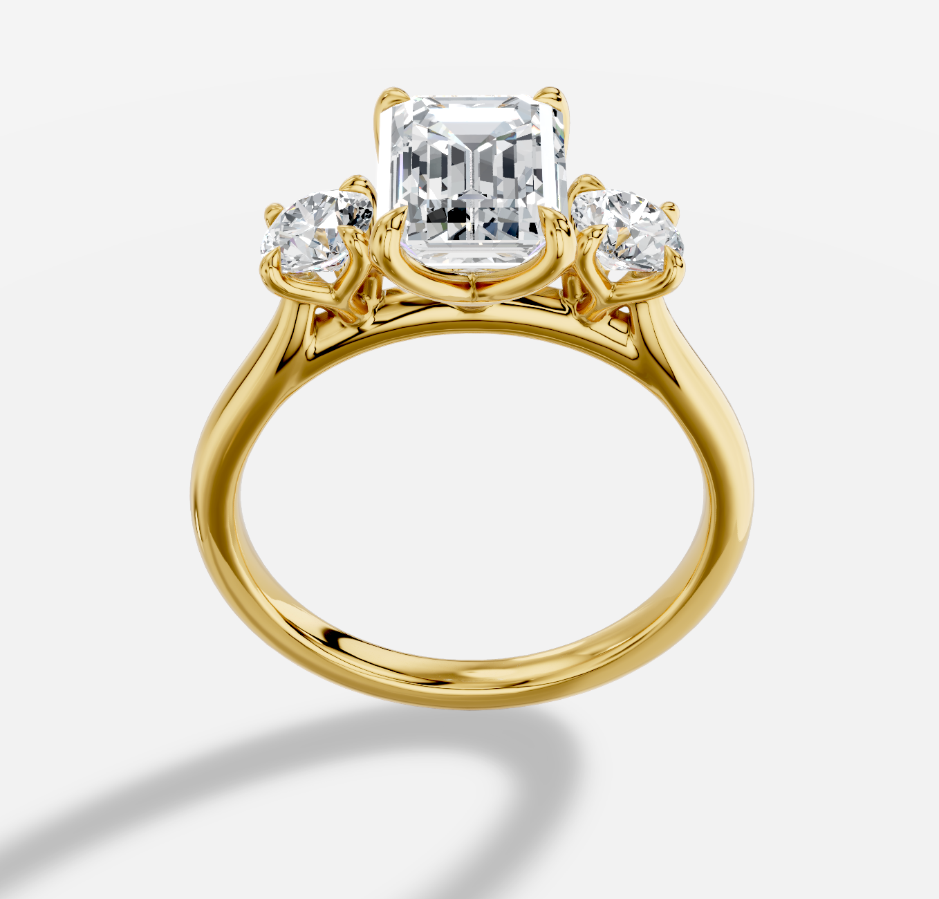 Emerald Cut Three Stone Diamond Ring  in 18K Yellow Gold