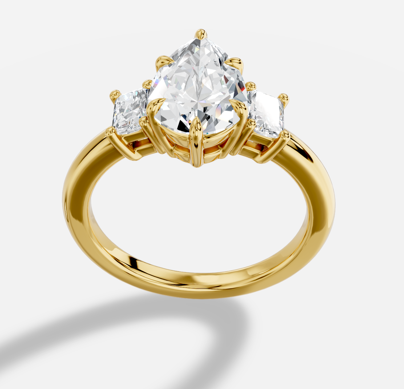 Pear Three Stone  Diamond Ring in 18K Yellow Gold